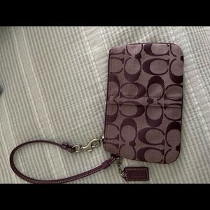 Purple coach wristlet